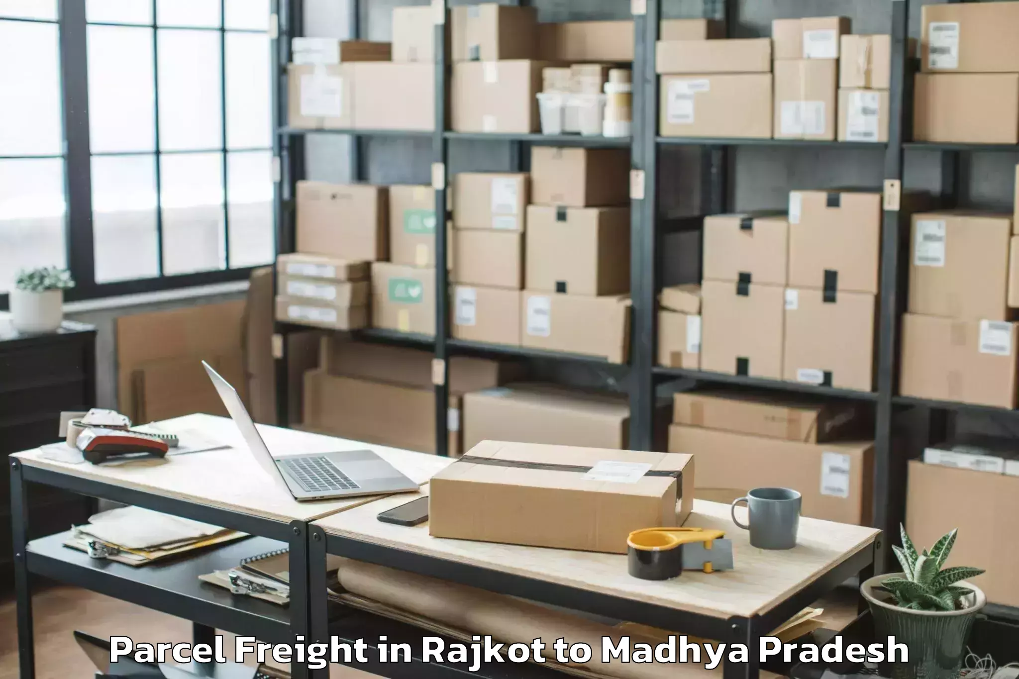 Book Rajkot to Punasa Parcel Freight Online